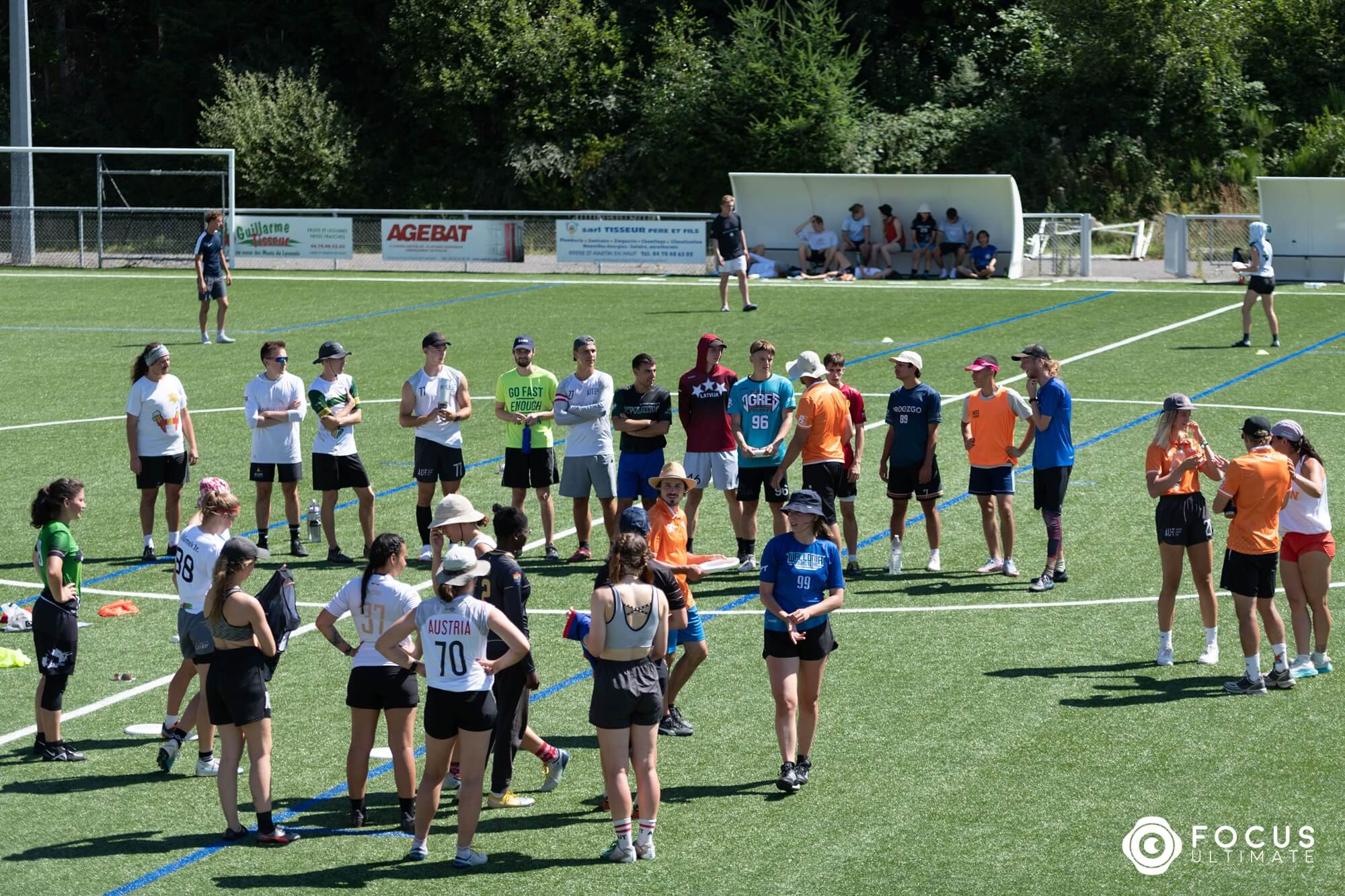 Coaches talking to players